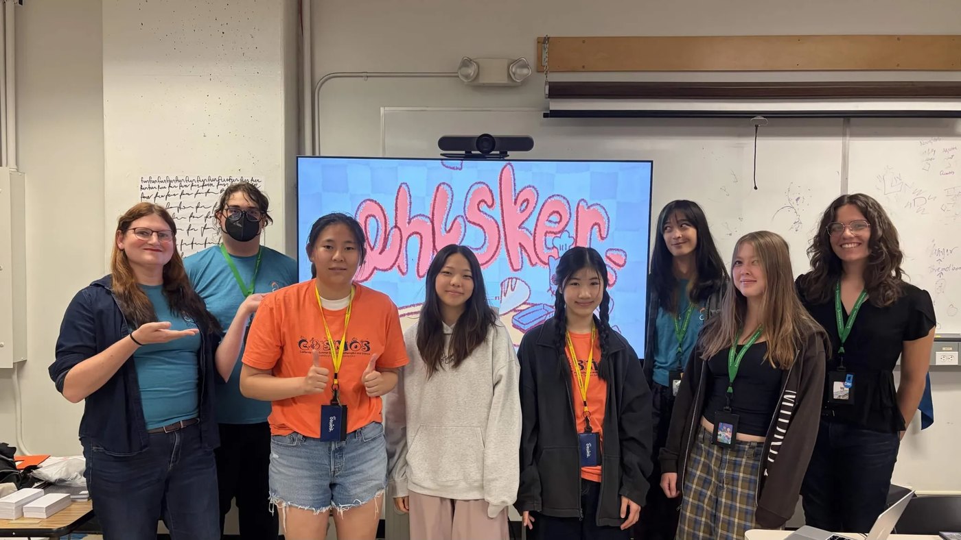 The Whisker team with our COSMOS instructors at UC Santa Cruz, the game's title screen behind us
